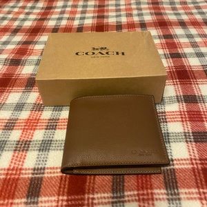 Mens coach wallet.  Never used.
